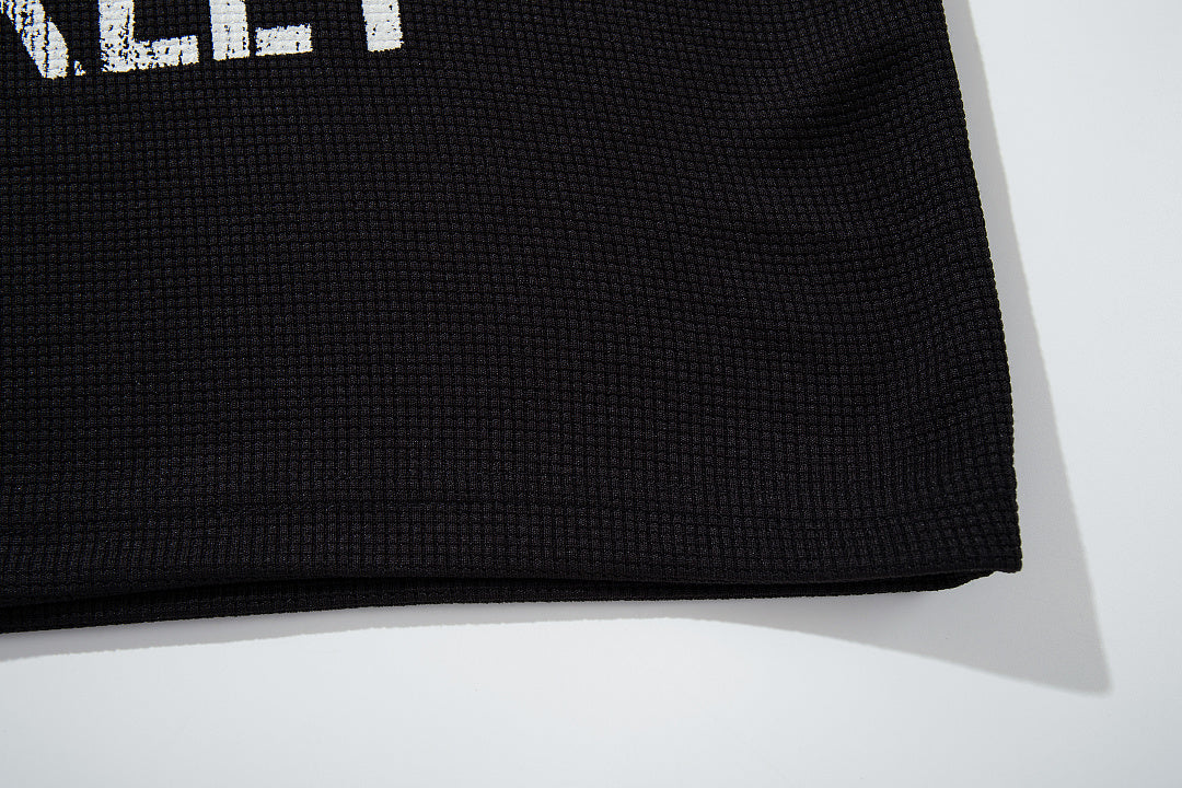 Black long-sleeve raglan T-shirt with camouflage pattern