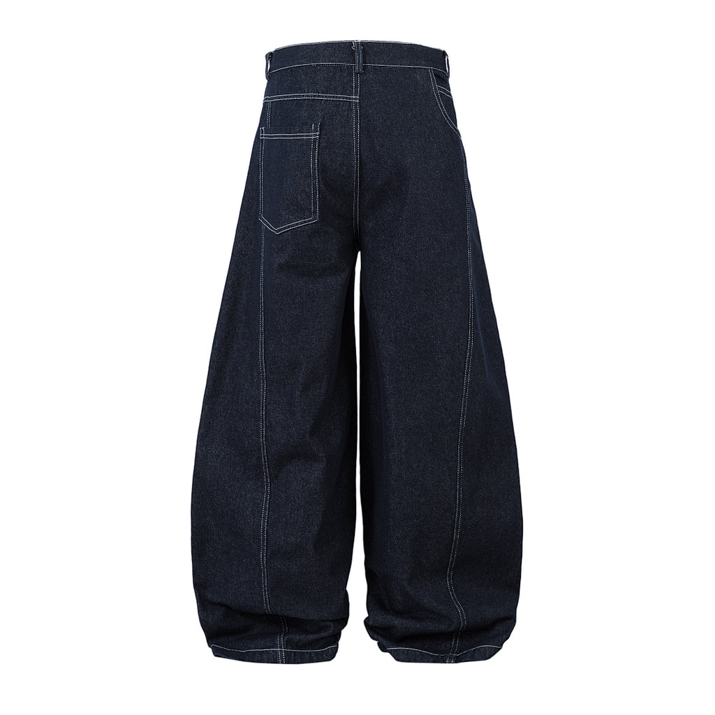 Scimitar-cut raw denim – Blue