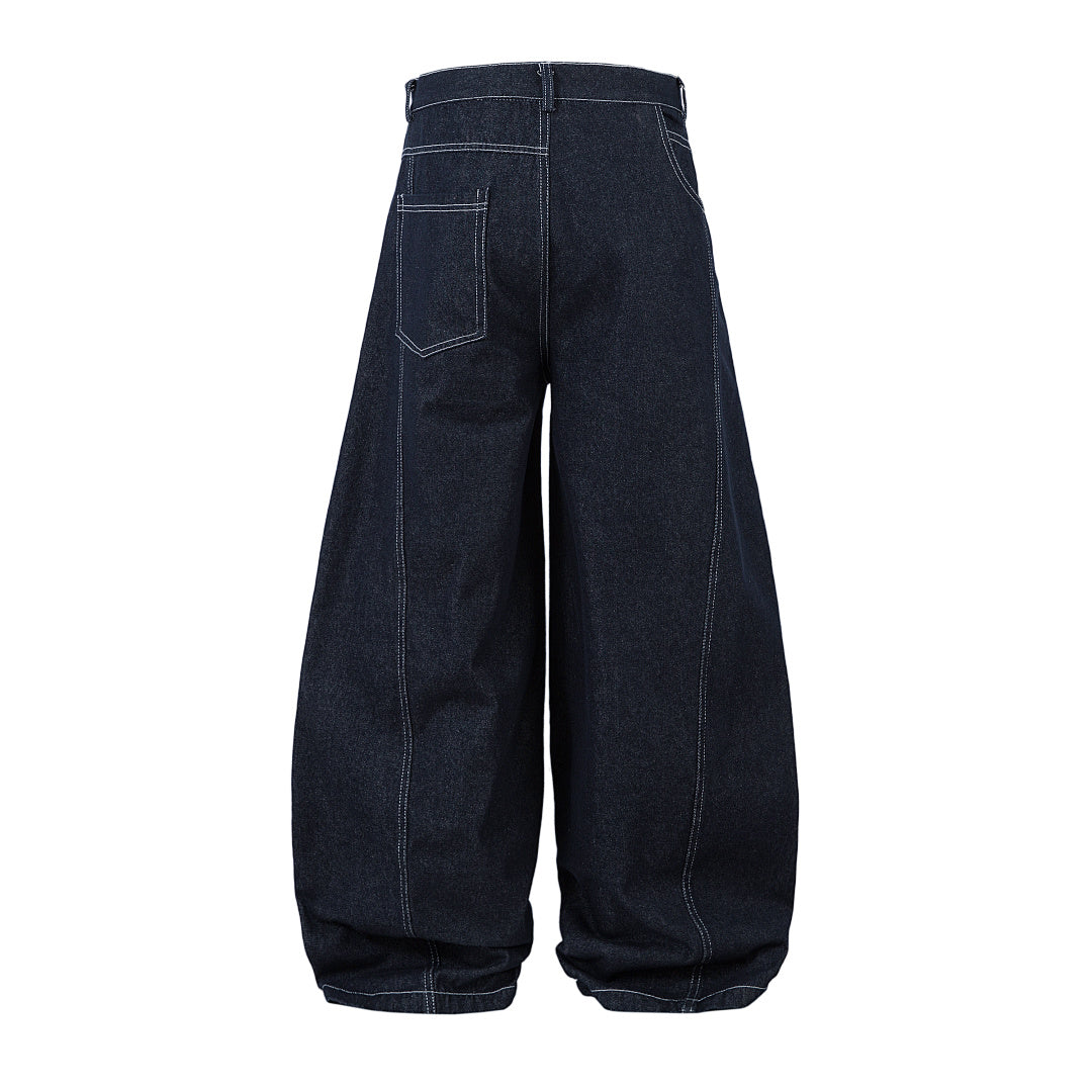 Scimitar-cut raw denim – Blue
