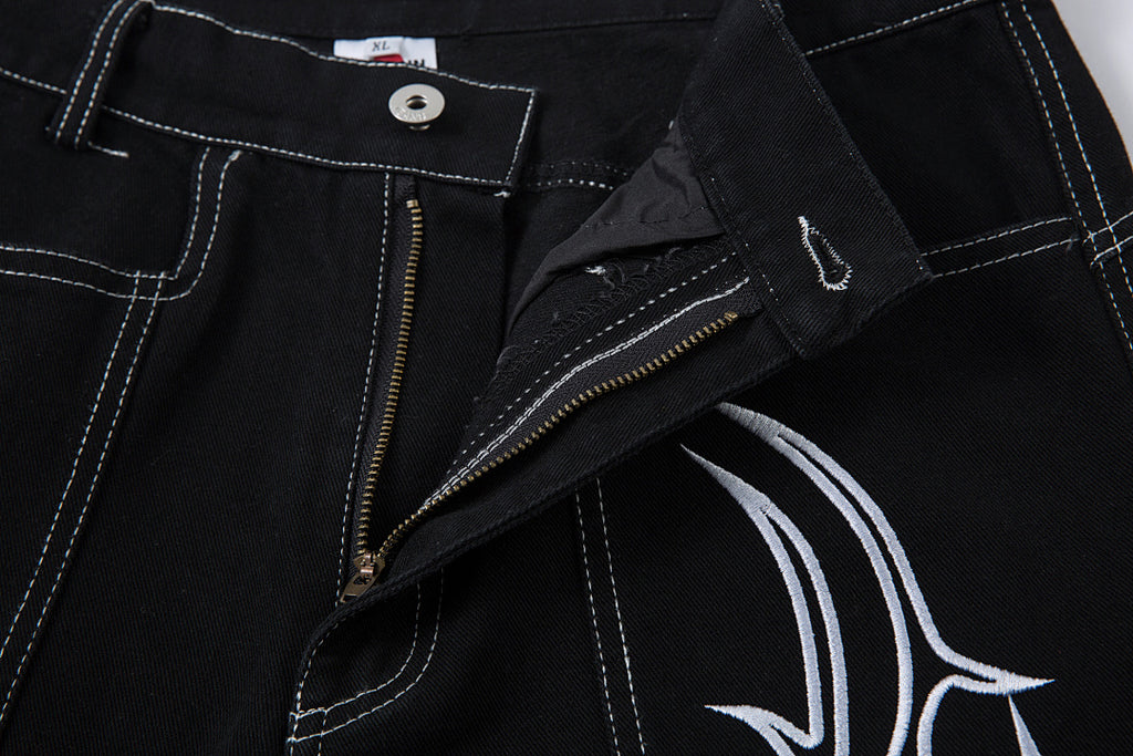Heavy-embroidery denim trousers