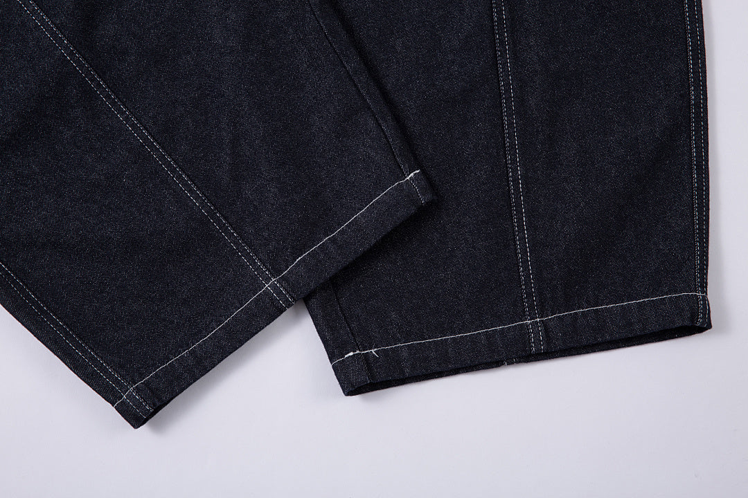 Scimitar-cut raw denim – Blue