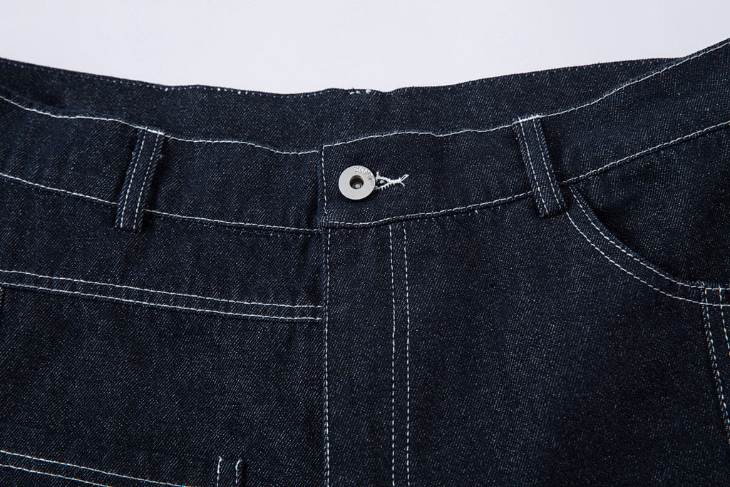 Scimitar-cut raw denim – Blue