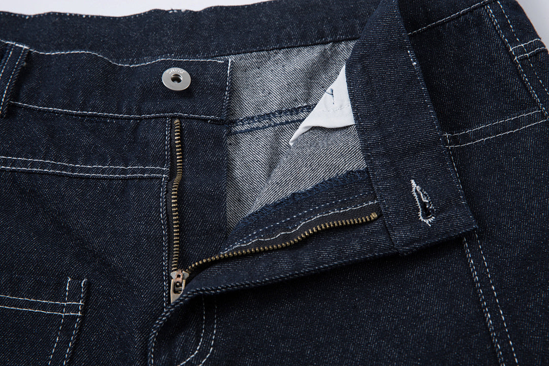 Scimitar-cut raw denim – Blue