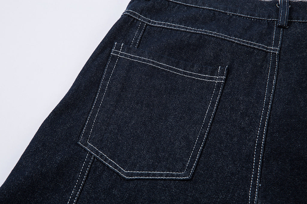 Scimitar-cut raw denim – Blue