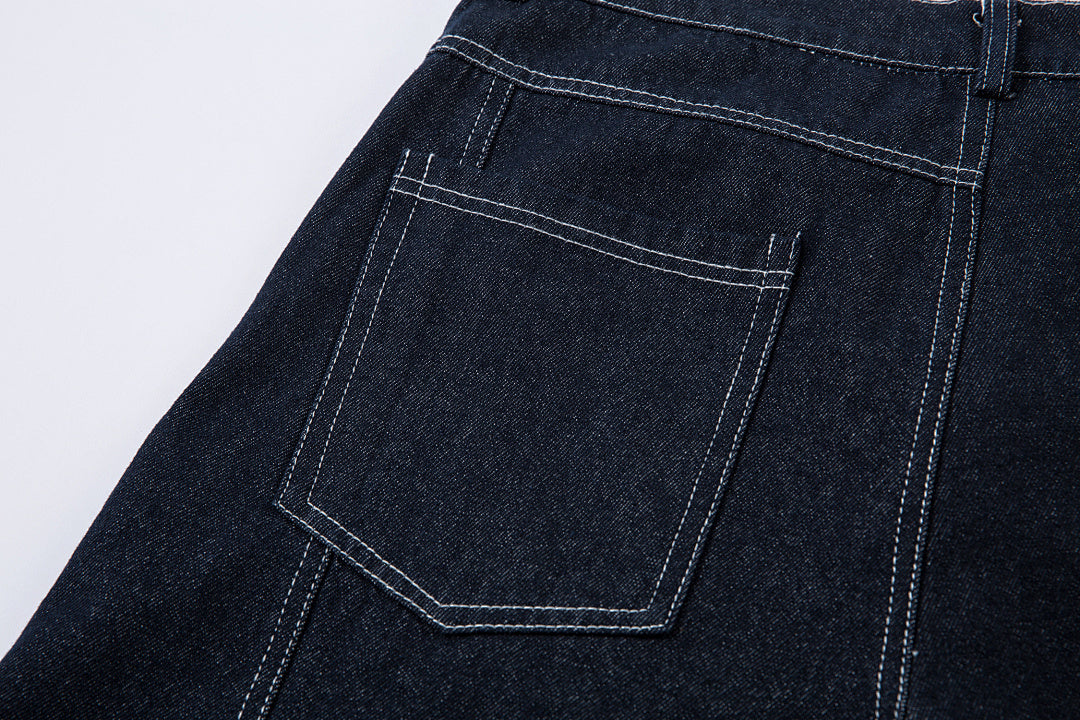 Scimitar-cut raw denim – Blue