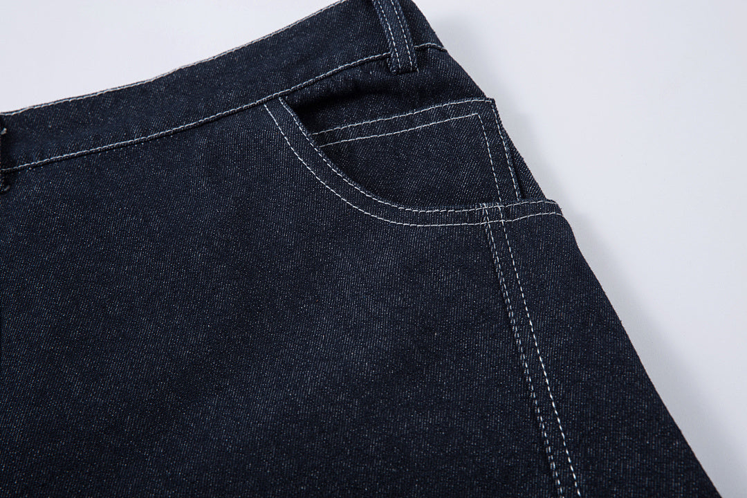 Scimitar-cut raw denim – Blue