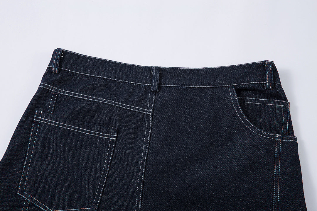 Scimitar-cut raw denim – Blue