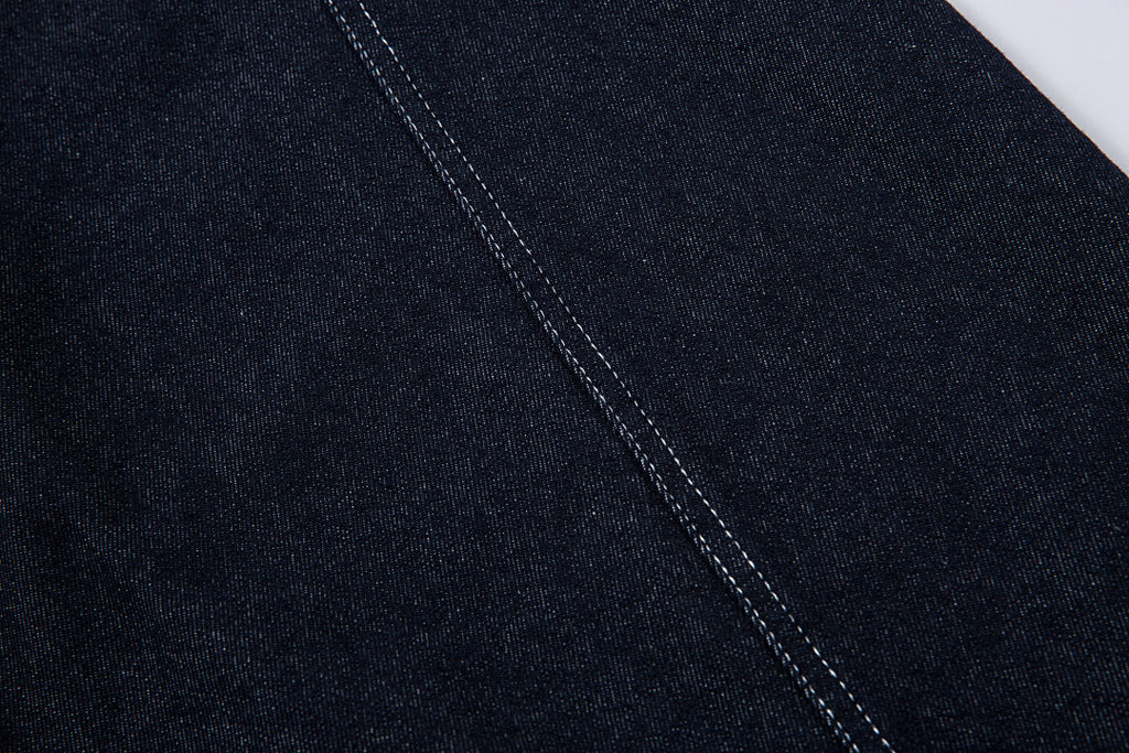Scimitar-cut raw denim – Blue