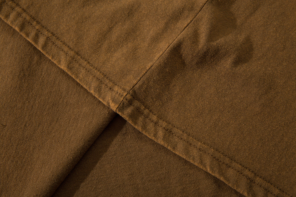 Positioning-stitch detail, heavy-wash short-sleeve T-shirt