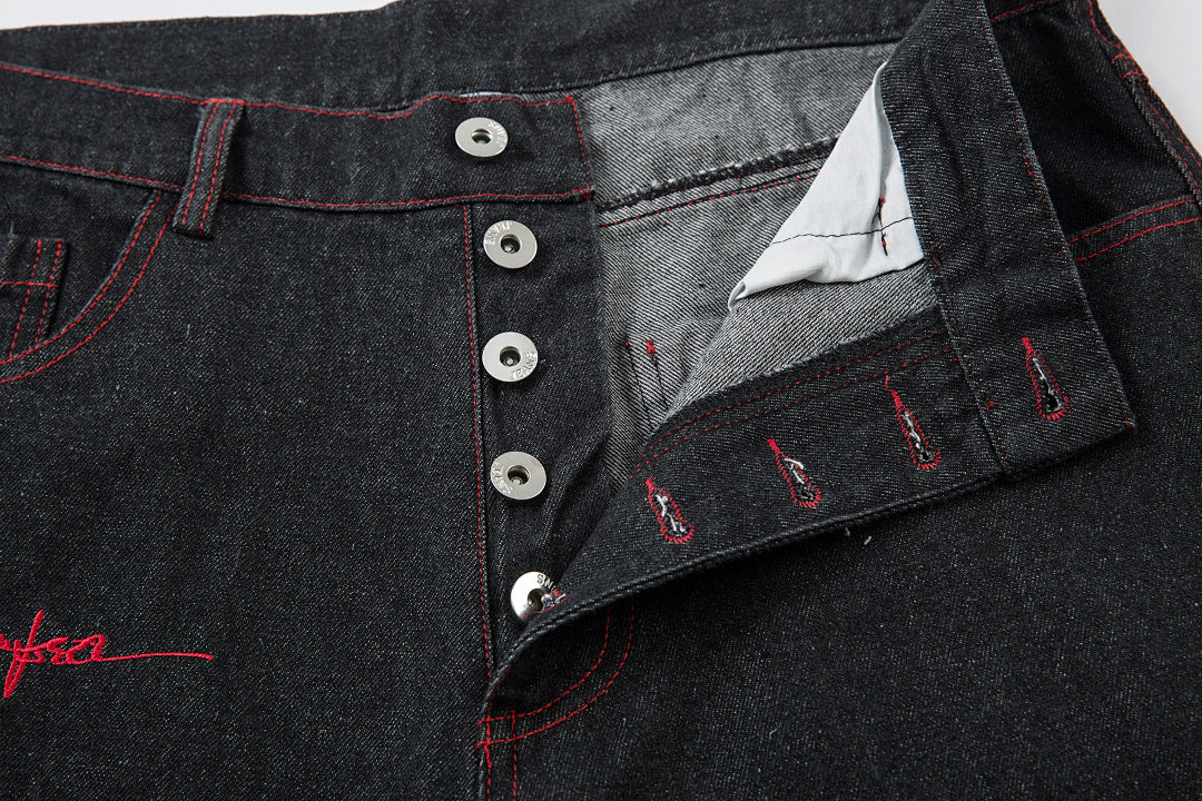 Embroidered denim trousers
