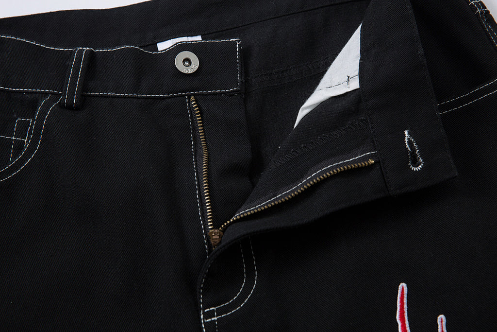 Embroidered denim trousers