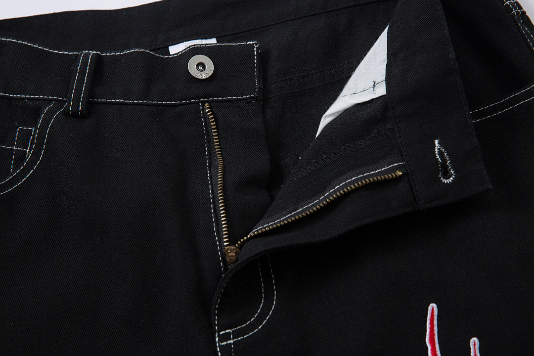 Embroidered denim trousers