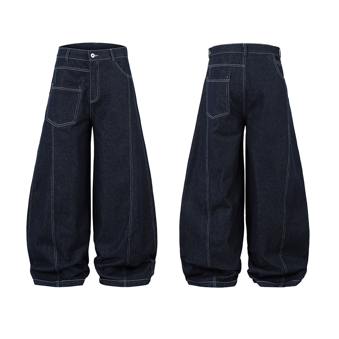 Scimitar-cut raw denim – Blue